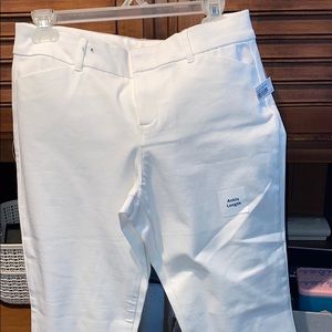 Pair of white ankle length pixie pants